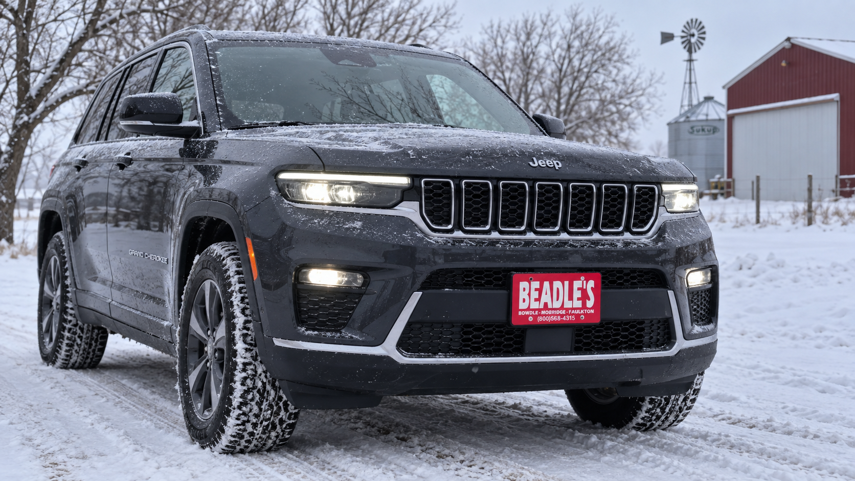 2027 Jeep Grand Cherokee 4x4 in the snow on a South Dakota gravel road, at Beadle's Chrysler Center