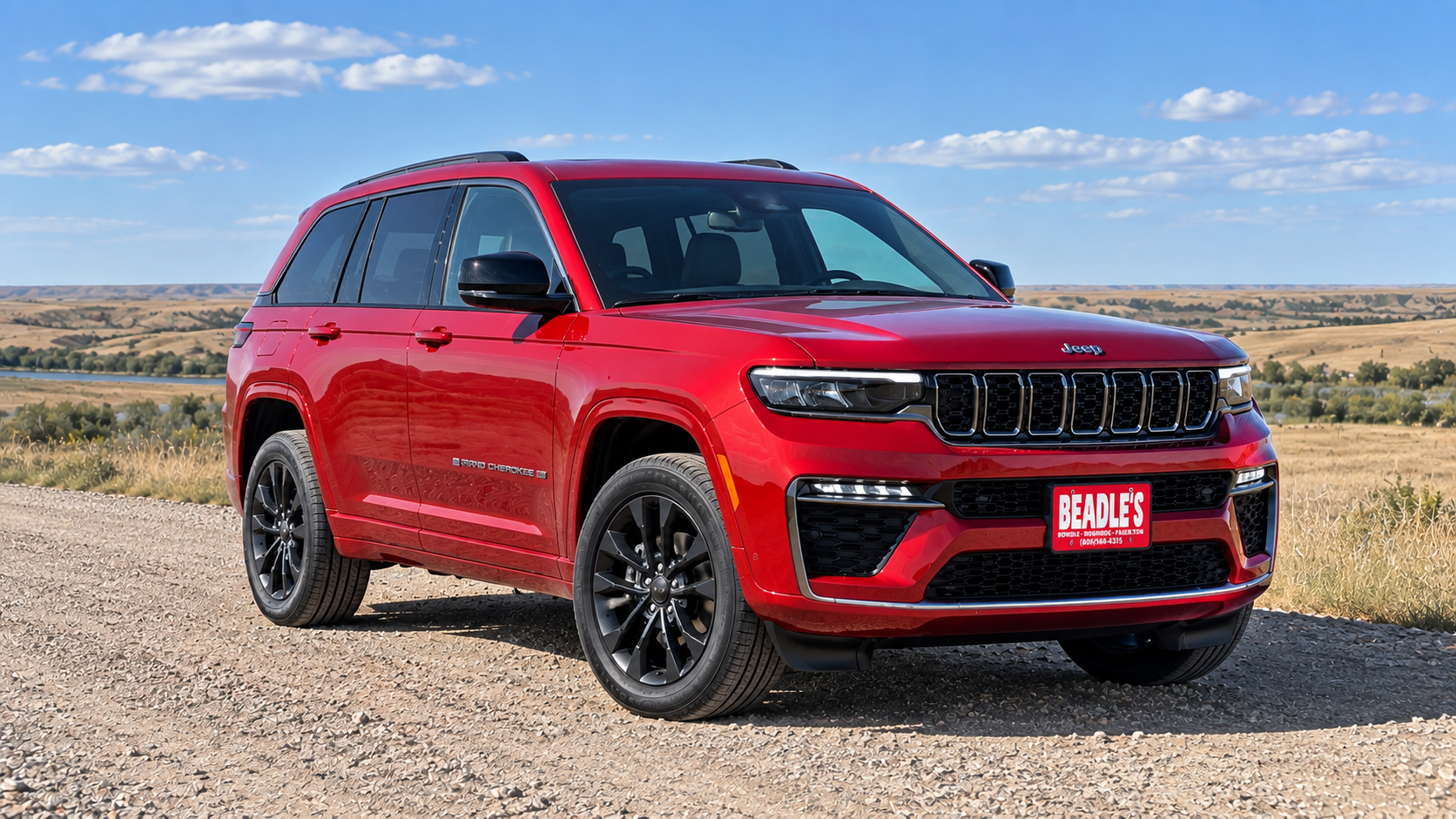 2027 Jeep Grand Cherokee in Red Hot exterior paint, at Beadle's Chrysler Center
