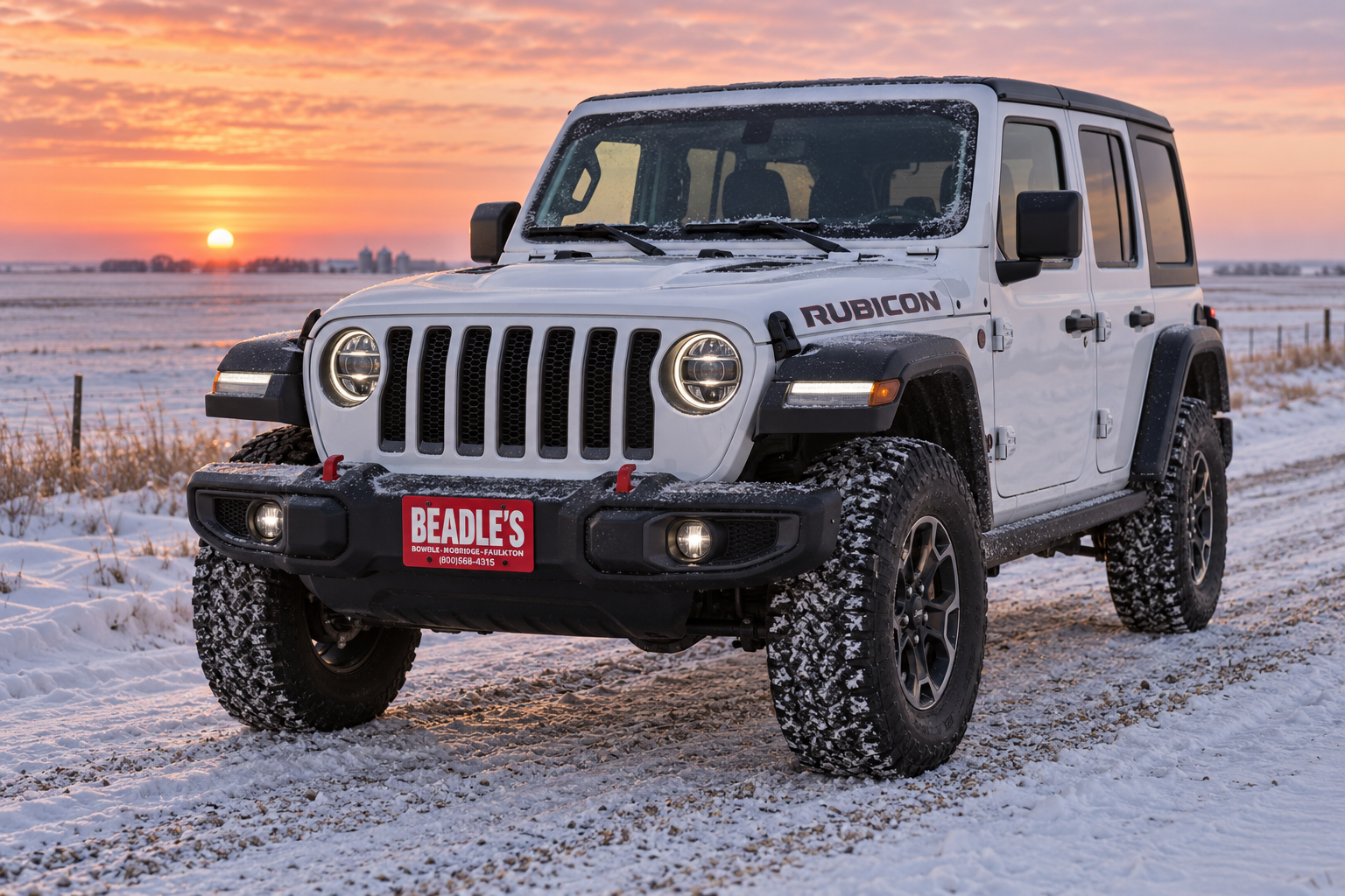 2027 Jeep Wrangler Rubicon at a snowy South Dakota sunrise, at Beadle's Chrysler Center
