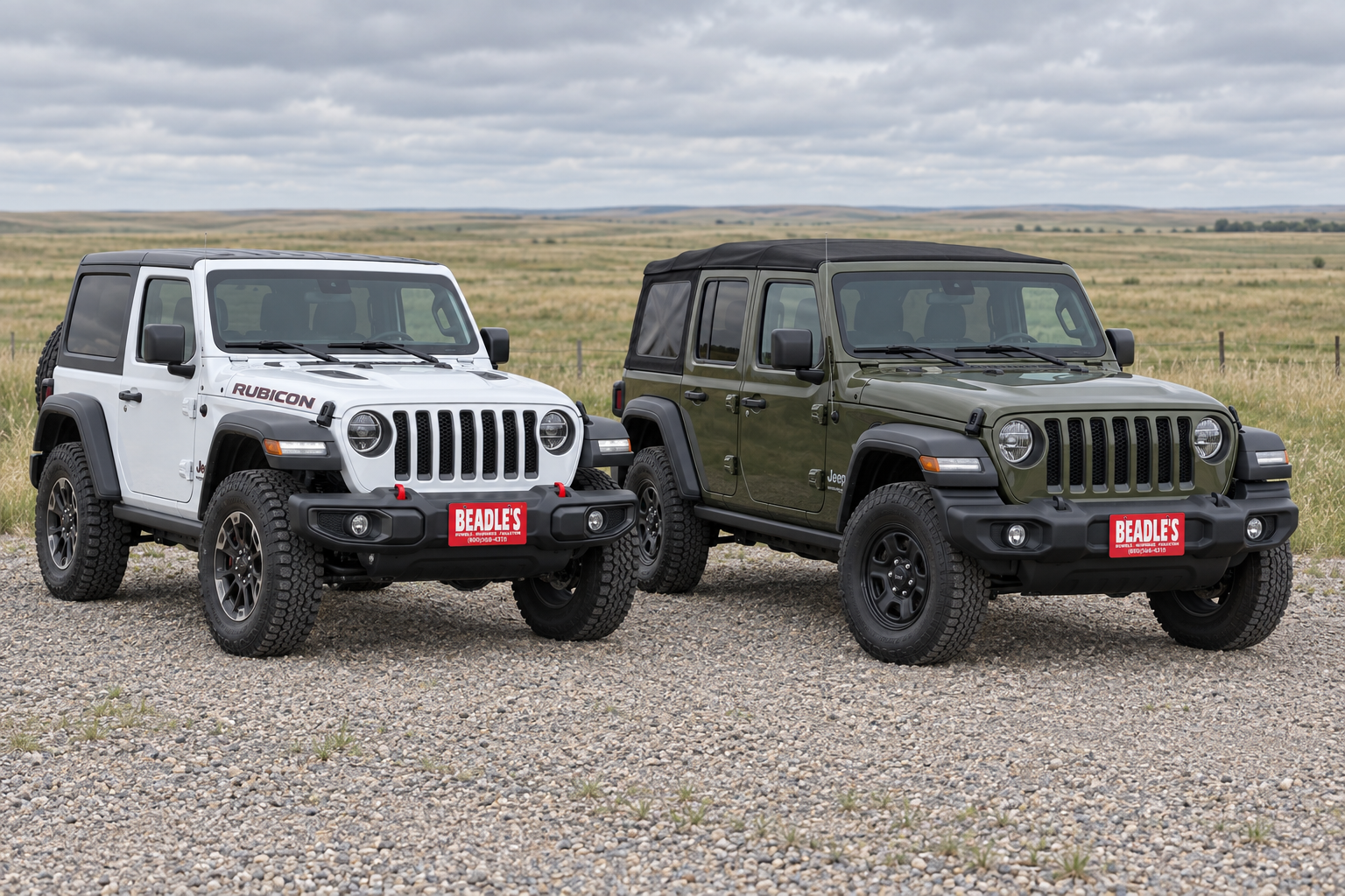 2026 Jeep Wrangler 2-door and 4-door parked side by side on a South Dakota gravel road, at Beadle's Chrysler Center